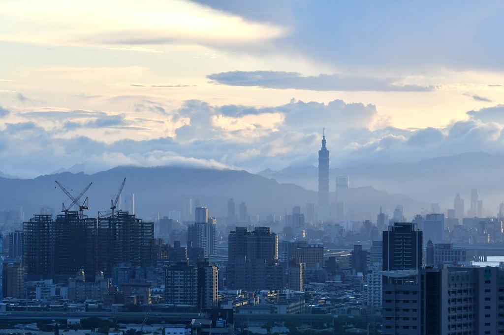 5G towers in a cityscape